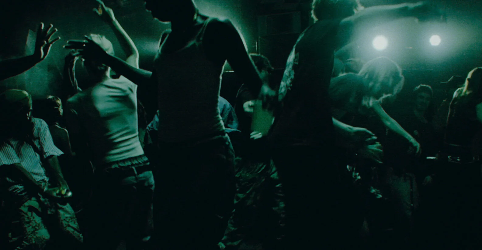 Dancers in the crowd scene in the barn, a frame from the finished film