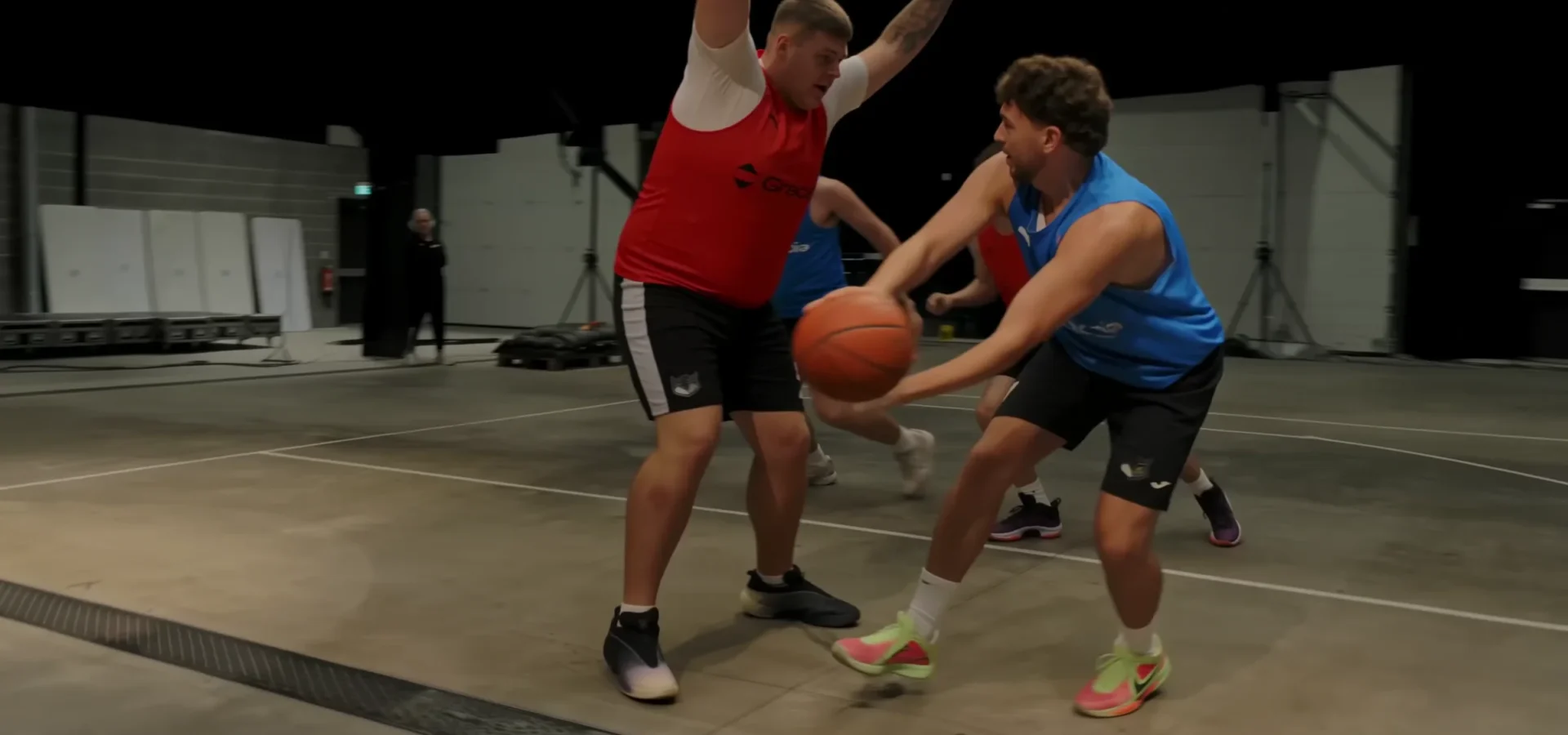 Two players contesting the ball, frozen in the 4D scene